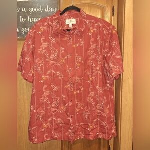 An Island Shores short sleeve button-down Hawaiian shirt in a size men's XL